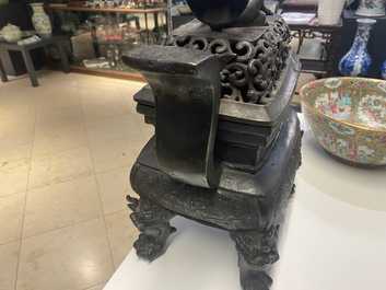 A large Chinese bronze censer and cover, Ming